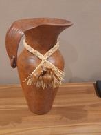 Terracotta vaas, Ophalen