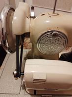 Retro naaimachine, Ophalen