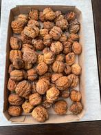 Mooie dikke okkernoten, vers en onbespoten, Ophalen