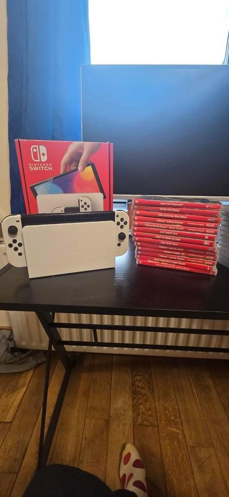 Nintendo switch Oled + 11 games + PokemonBall, Games en Spelcomputers, Spelcomputers | Nintendo Switch, Zo goed als nieuw, Switch OLED