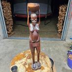 Houten afrikaans beeld, Ophalen