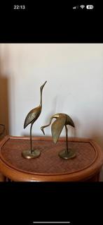 2 messing kraanvogels, Ophalen