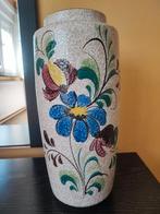 Antieke vaas met bloemen, Ophalen