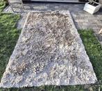 grand tapis moelleux, Ophalen