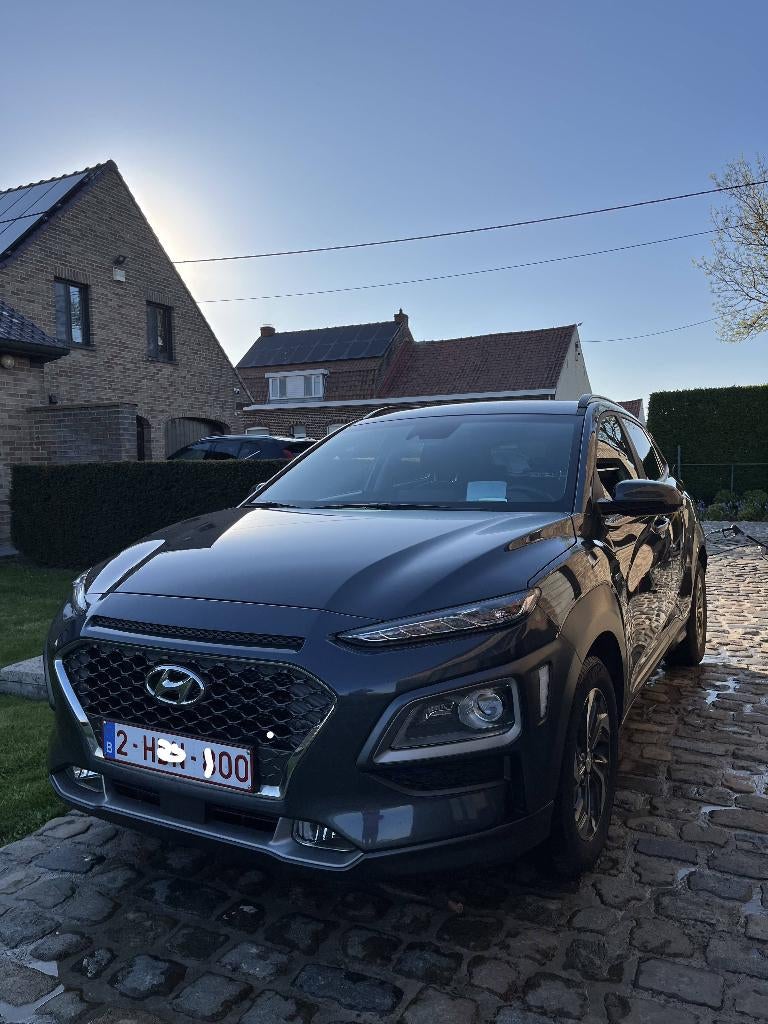 hybride et toutes options, Hyundai Kona, parfait état., Autos, Cuir, Argent ou Gris, Achat, Euro 6