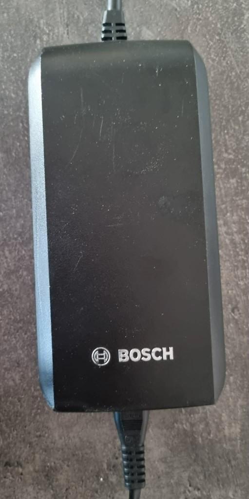 Bosch lader: Charger Compact 2A | BCS230, Fietsen en Brommers, Fietsaccessoires | Fietsaccu's, Ophalen of Verzenden