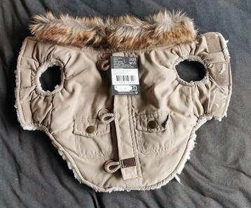 Hondejasje beschikbaar voor biedingen