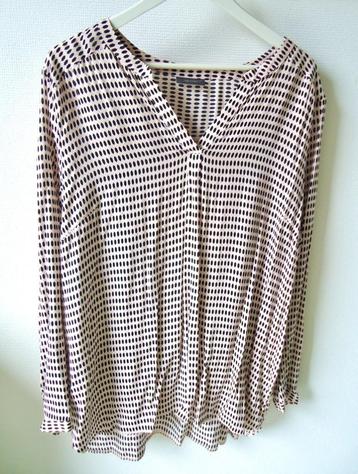 Losse blouse beschikbaar voor biedingen