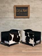 2 fauteuils in koeienleder en fluweelstof / prijs per stoel, Comme neuf, Tissus, 75 à 100 cm, Exclusief
