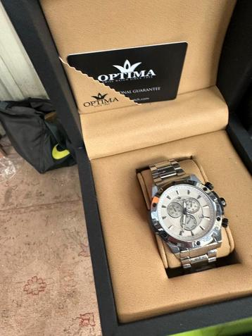 montre optima suiss 250euro, Enlèvement ou Envoi, Utilisé