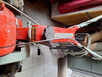 Motorculteur met ploeg beschikbaar voor biedingen