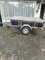 Vernieuwde aanhangwagen, Ophalen