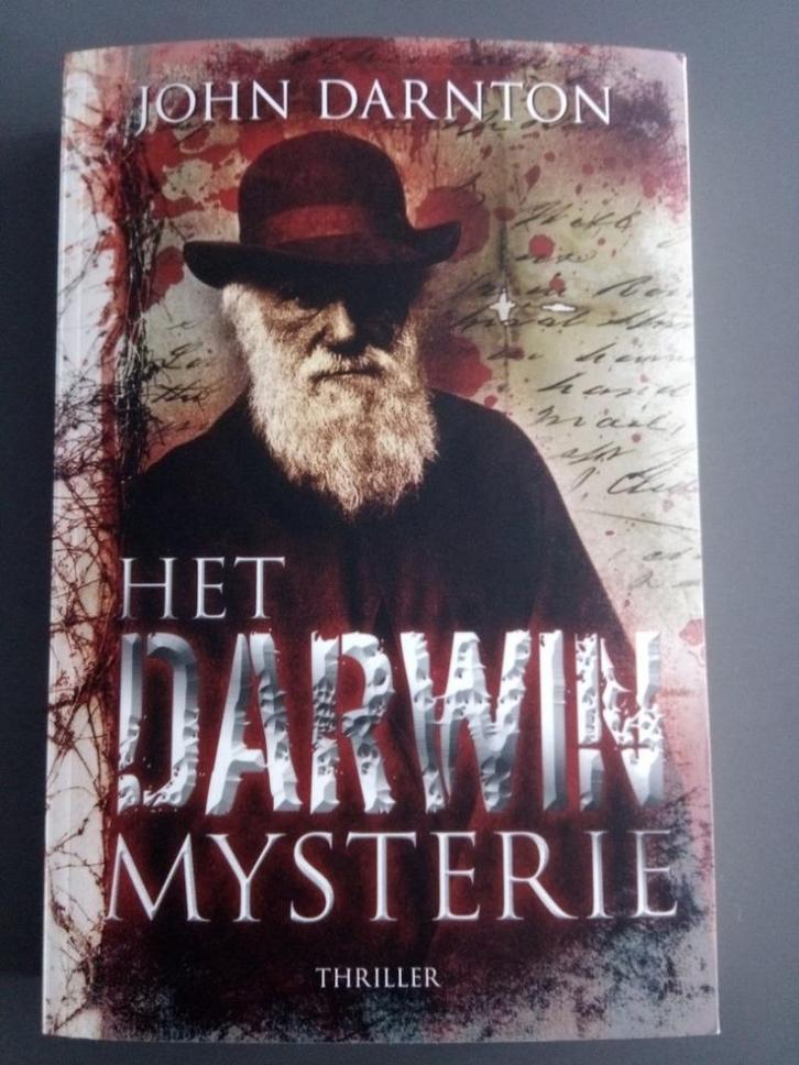 'Het Darwin Mysterie' van John Darnton, Boeken, Thrillers, Nieuw, Amerika, Ophalen of Verzenden