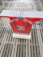 Banc plat et épais Holzmann, Enlèvement