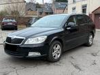 Skoda Octavia 1.6TDI, Auto's, Voorwielaandrijving, Euro 5, Stof, Zwart