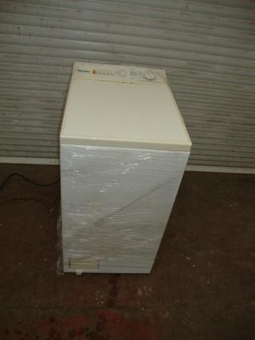 Wasmachine miele, Enlèvement