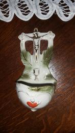 Porseleinen wijwatervat Hart., Enlèvement