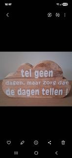 Spreuk in hout, Ophalen