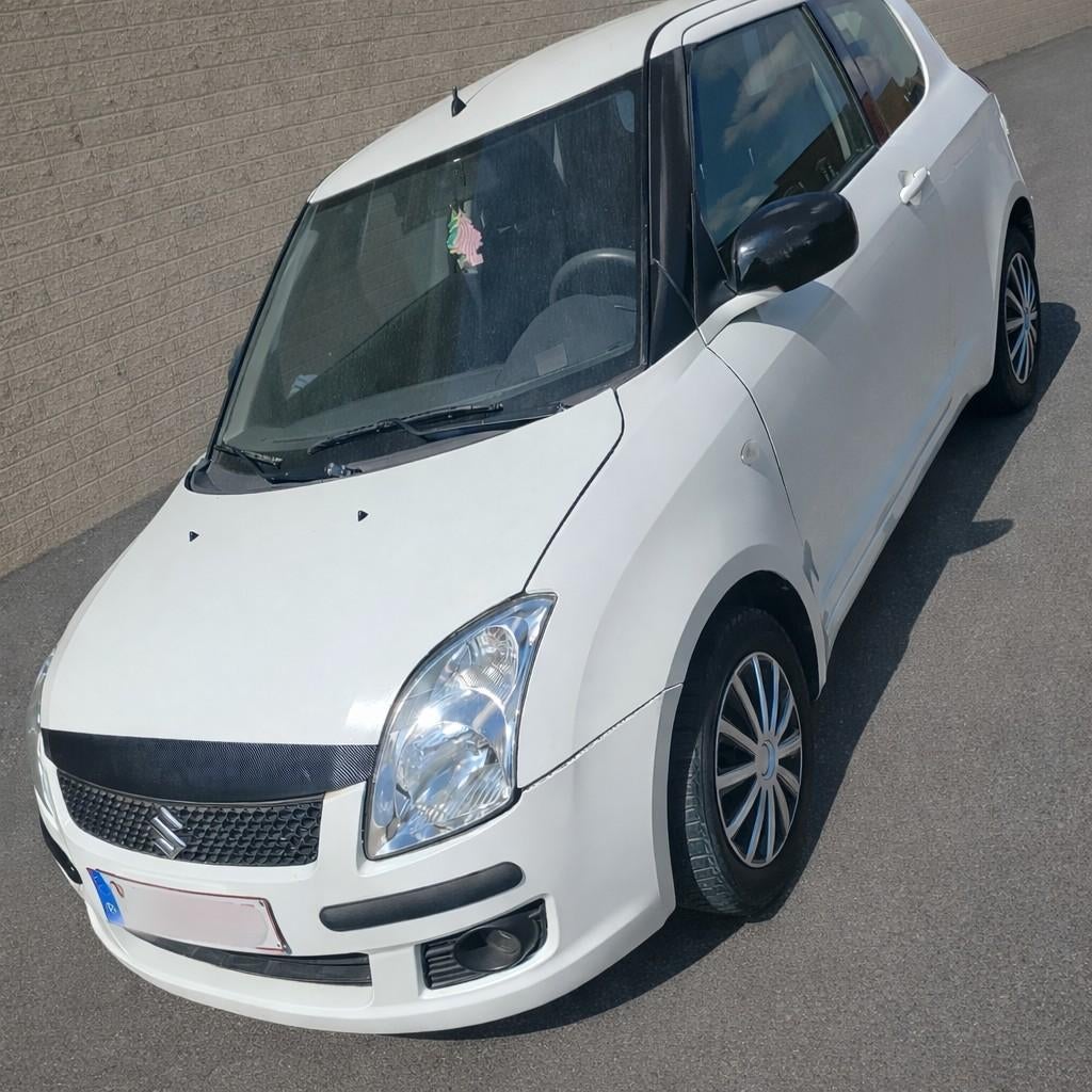 Suziki swift 1.3i  prêt à immatriculer