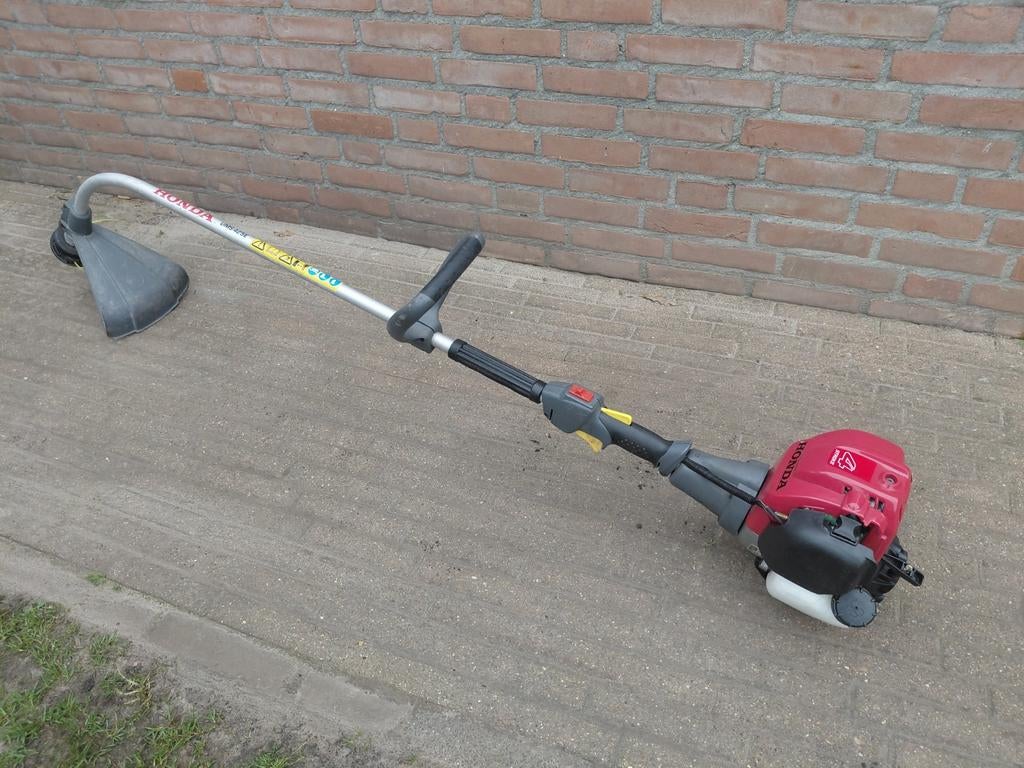 Honda UMS 425E Grastrimmer - Klaar voor gebruik!, Tuin en Terras, Bosmaaiers, Zo goed als nieuw, Benzine, 10 tot 30 cm, Ophalen