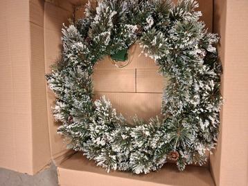 Kerstkrans met lampjes beschikbaar voor biedingen