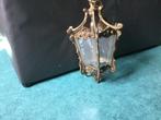 Antieke bronzen luster, Ophalen