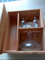 Portokaraf in houten kist, Ophalen