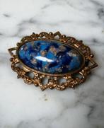 grote vintage broche  blauwe steen ovaal, Bijoux, Sacs & Beauté, Broches, Enlèvement ou Envoi, Cuivre