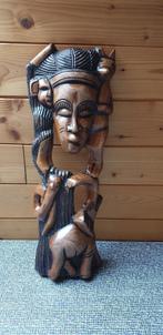 Afrikaans houten beeld, Enlèvement ou Envoi