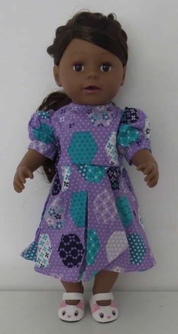 poppenkleertjes babypop born 43cm  (jurk met jas) beschikbaar voor biedingen