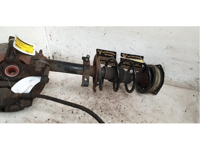 Schokdemperpoot links-voor van een Renault Megane Scenic, Auto-onderdelen, Ophanging en Onderstel, Renault, Gebruikt, 3 maanden garantie