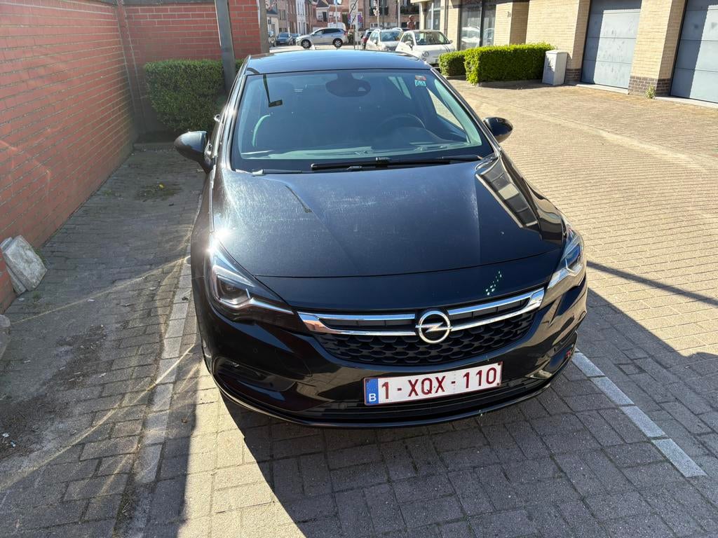 Opel Astra 1.6 turbo, Auto's, Voorwielaandrijving, Leder en Stof, Zwart, 5 deurs