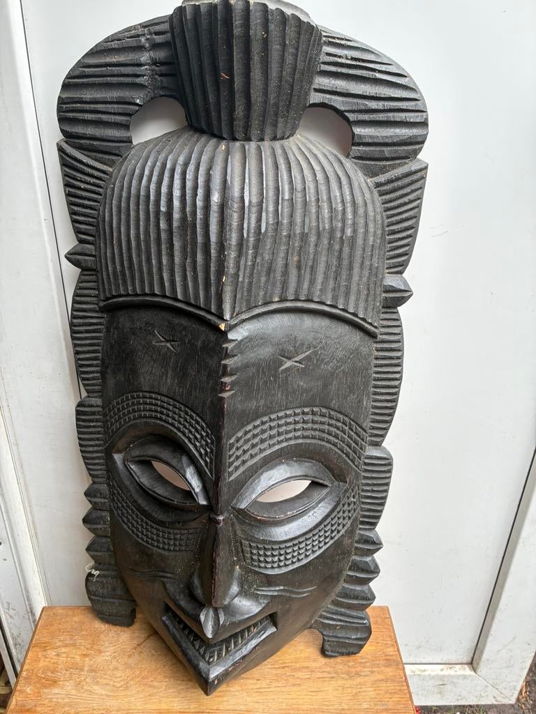 Afrikaans masker, Ophalen
