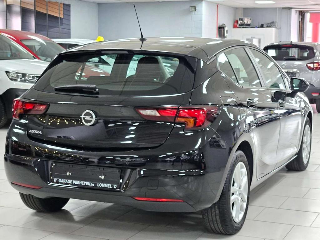 Opel Astra 1.2i Turbo Crply Cruise BiZone SIEGES Chauffants, Auto's, Stof, Gebruikt, 1199 cc, Zwart