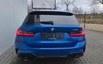 BMW 330 iA Touring MPack/19inch/Garantie, Auto's, BMW, Automaat, Achterwielaandrijving, Blauw, 2996 cc