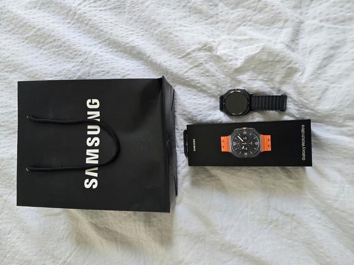 Samsung Galaxy Watch Ultra + Samsung Trail Band (Dark Gray), Handtassen en Accessoires, Smartwatches, Zo goed als nieuw, Ophalen