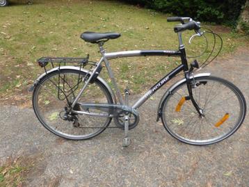 herenfiets met versnellingen in goede rijdende staat beschikbaar voor biedingen