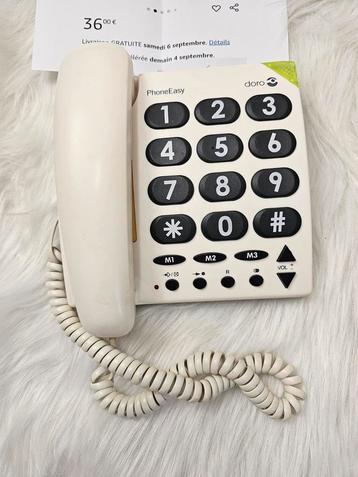 Analoge telefoon met grote knoppen voor senioren  beschikbaar voor biedingen