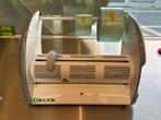 Snijmachine, Ophalen