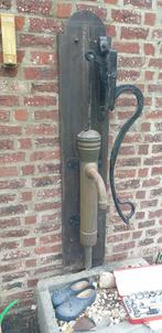 Waterpomp van koper, Ophalen