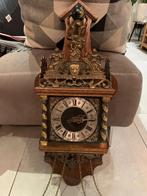 Zaanse klok, Ophalen