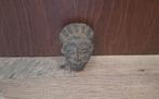 Maskertje uit nigeria, Ophalen