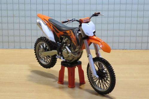 KTM 450 SX-F 2013 1:12 603001, Hobby en Vrije tijd, Modelauto's | 1:5 tot 1:12, Nieuw, Motor, 1:9 t/m 1:12, Ophalen of Verzenden