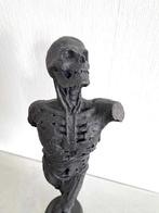 Grand écorché sculpture, Ophalen