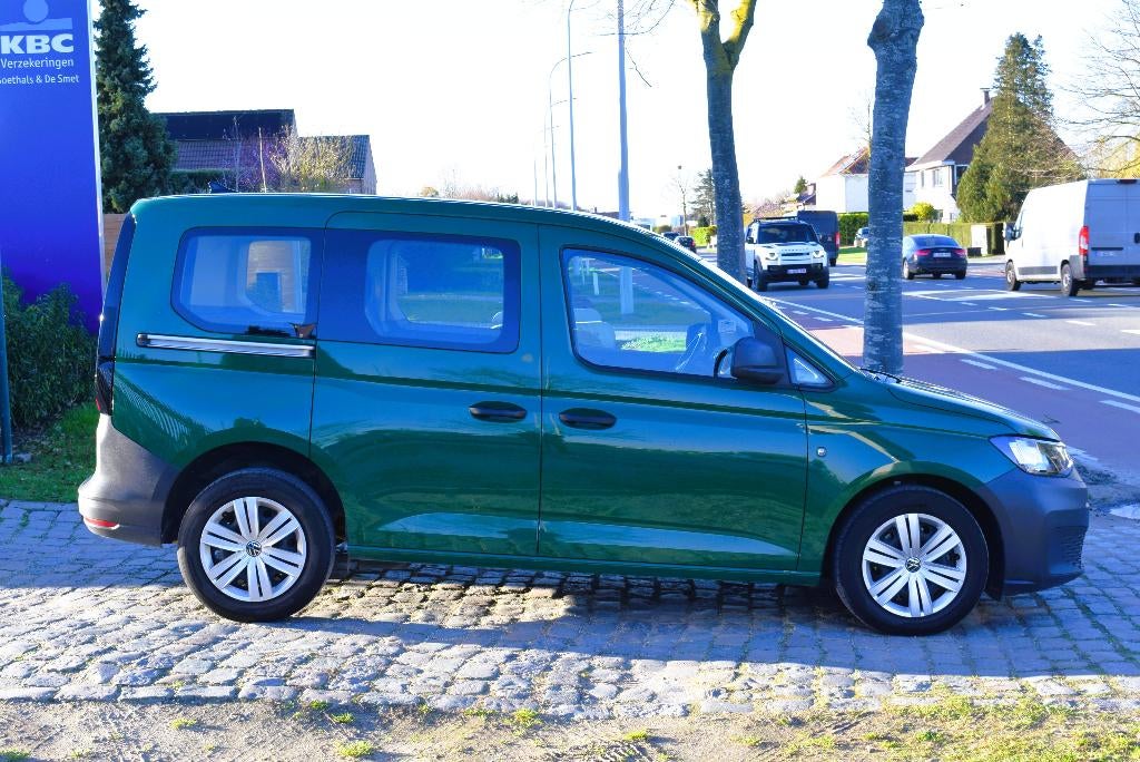 Vw Caddy 1.5TSI DSG/1st Owner/HISTORY/GARANTIE, Auto's, 5 zetels, 84 kW, USB, Groen