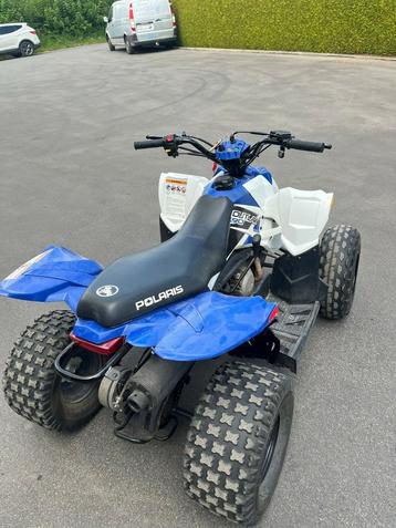 Quad Polaris Outlaw 90cc blanc/bleu beschikbaar voor biedingen