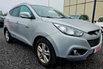 Hyundai ix35 1.6cc Benzine kilometer 61000, Auto's, Zwart, 4 cilinders, 1600 cc, Leder en Stof