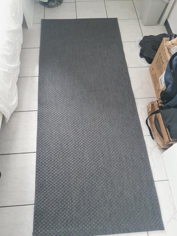 zwarte tapijt