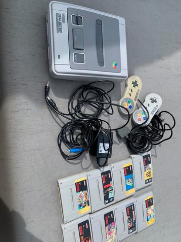Super nintendo met 8 games beschikbaar voor biedingen