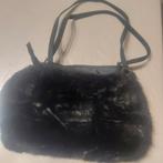 Mooie handtas, Enlèvement